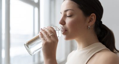 woman-drinking-water-after-exercise