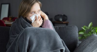 bored-sick-woman-holding-hand-head-blowing-nose-with-napkin_1262-18377