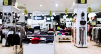 clothing-store-with-blurred-effect_23-2148164768