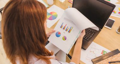 woman-office-exploring-statistics_23-2147668814