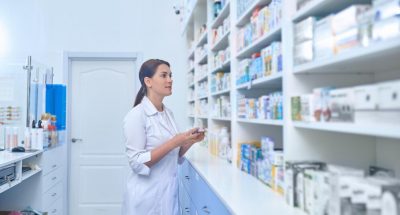 female-pharmacist-working-drugstore_259150-57972