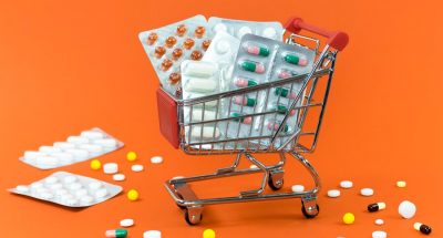high-angle-shopping-cart-with-pill-foils_23-2148533501
