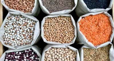 closeup-shot-various-legumes-eco-bags_181624-32592