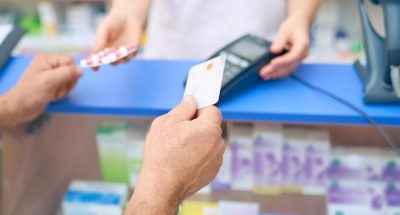 customer-paying-pills-using-credit-card_651396-1223