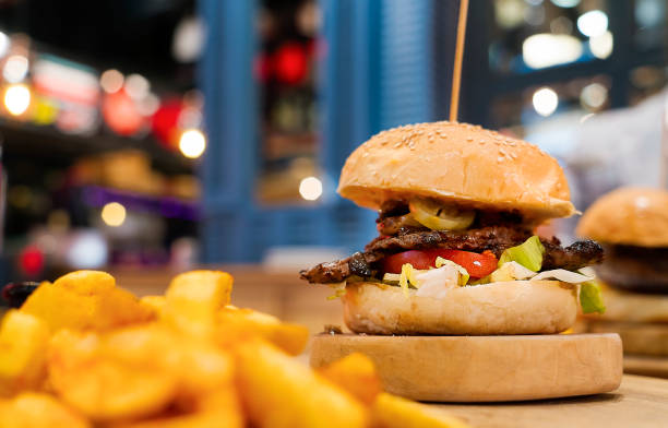 Steak burger with French fries chips