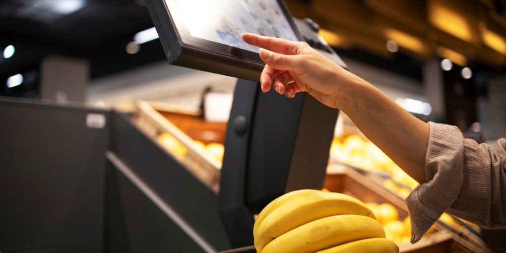 close-up-view-measuring-weight-fruit-supermarket_342744-1102