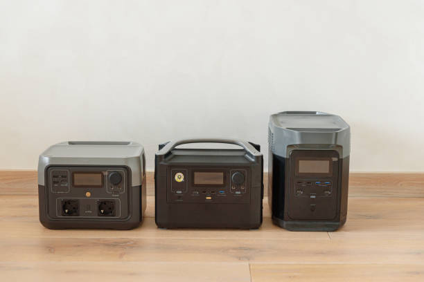 Uninterruptible power supply source. Variation of portable power stations staying on floor